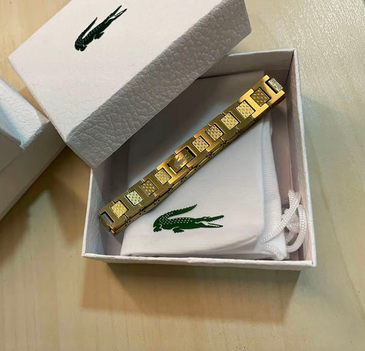 (3) BRAZALETE METROPOLE - DORADO